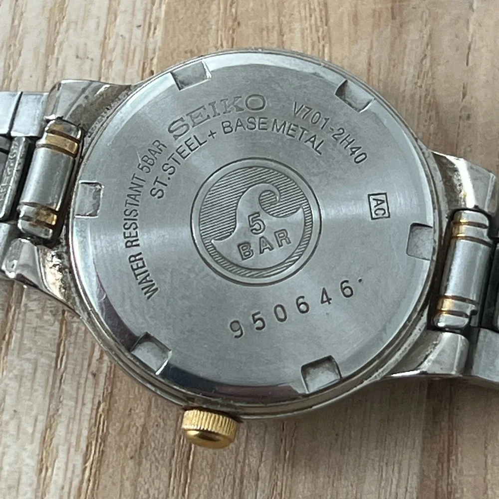 Seiko Ladies Watch Spiral Stainless Dial Gold-Tone Markers Two-Tone Bracelet